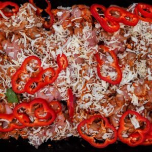 Straccetti di pollo e tacchino con peperoni e cipolla